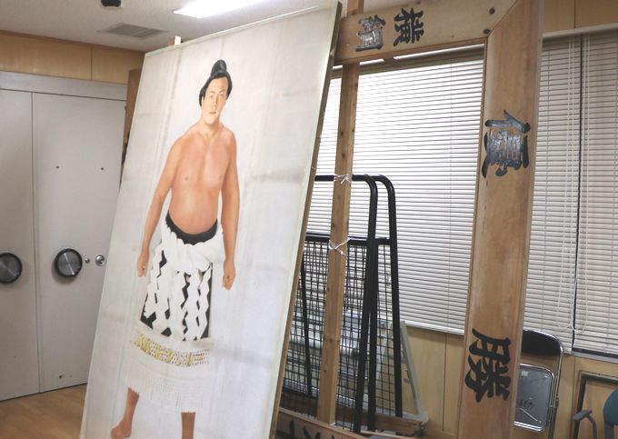 大相撲優勝額（千代の富士、昭和61年1月場所：吉備津神社所有）の 修復